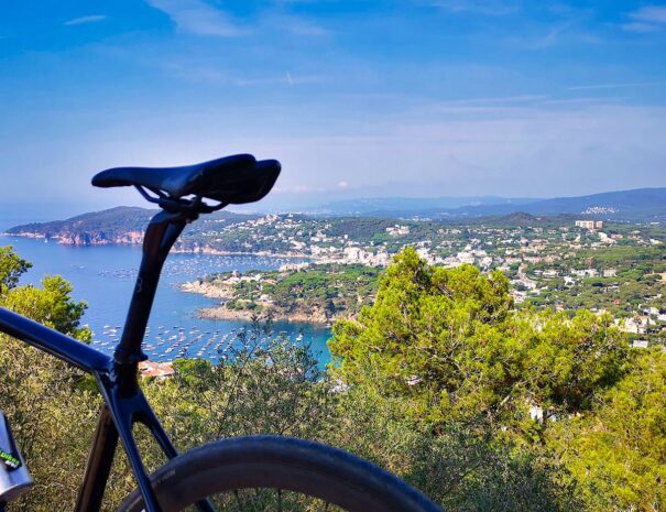 roadbike_with_background_of_palafrugell_beaches_taken_from_far_st_sebastian_lighthouse